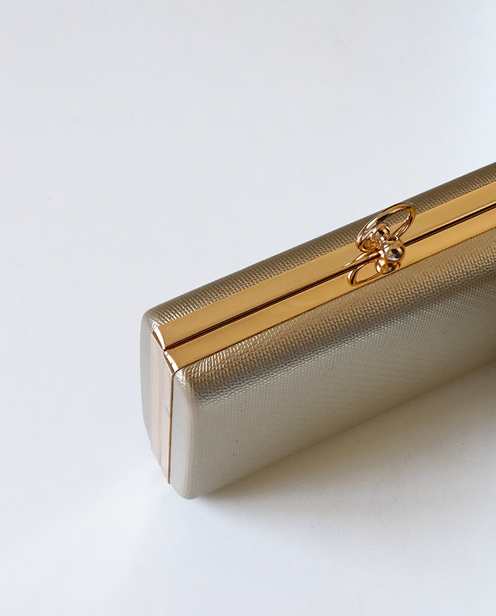 LORENZA RECTANGULAR CLUTCH WITH GOLDEN U RING BROOCH 